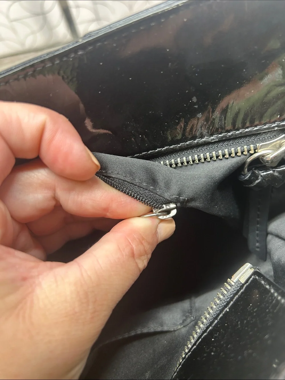 Coach black patent leather zip top tote bag